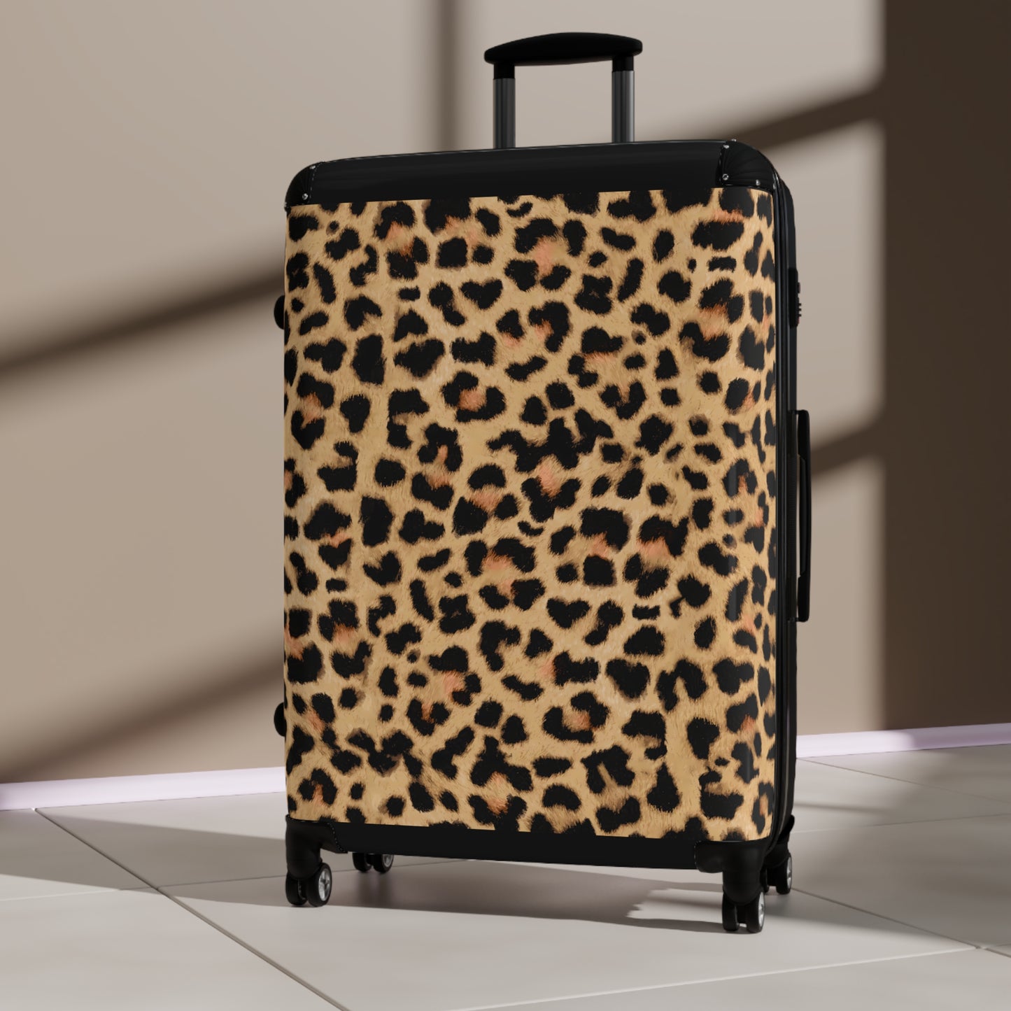 Leopard Print Suitcases in three sizes.