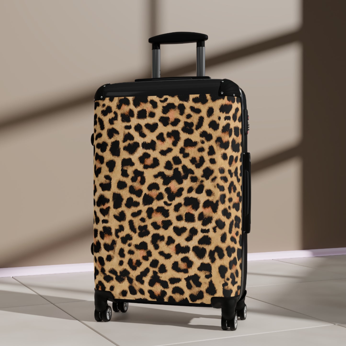 Leopard Print Suitcases in three sizes.