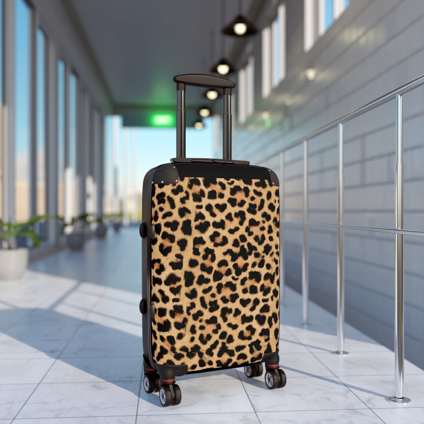 Leopard Print Suitcases in three sizes.