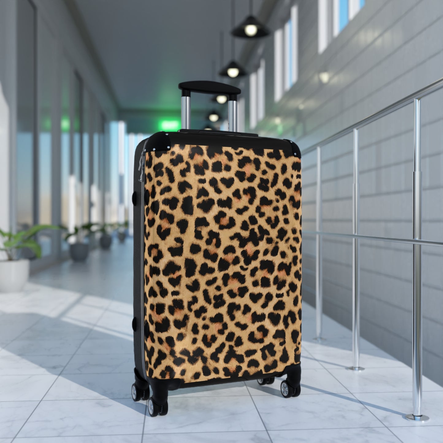 Leopard Print Suitcases in three sizes.