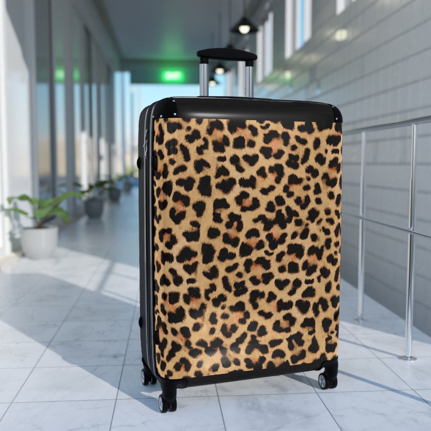 Leopard Print Suitcases in three sizes.